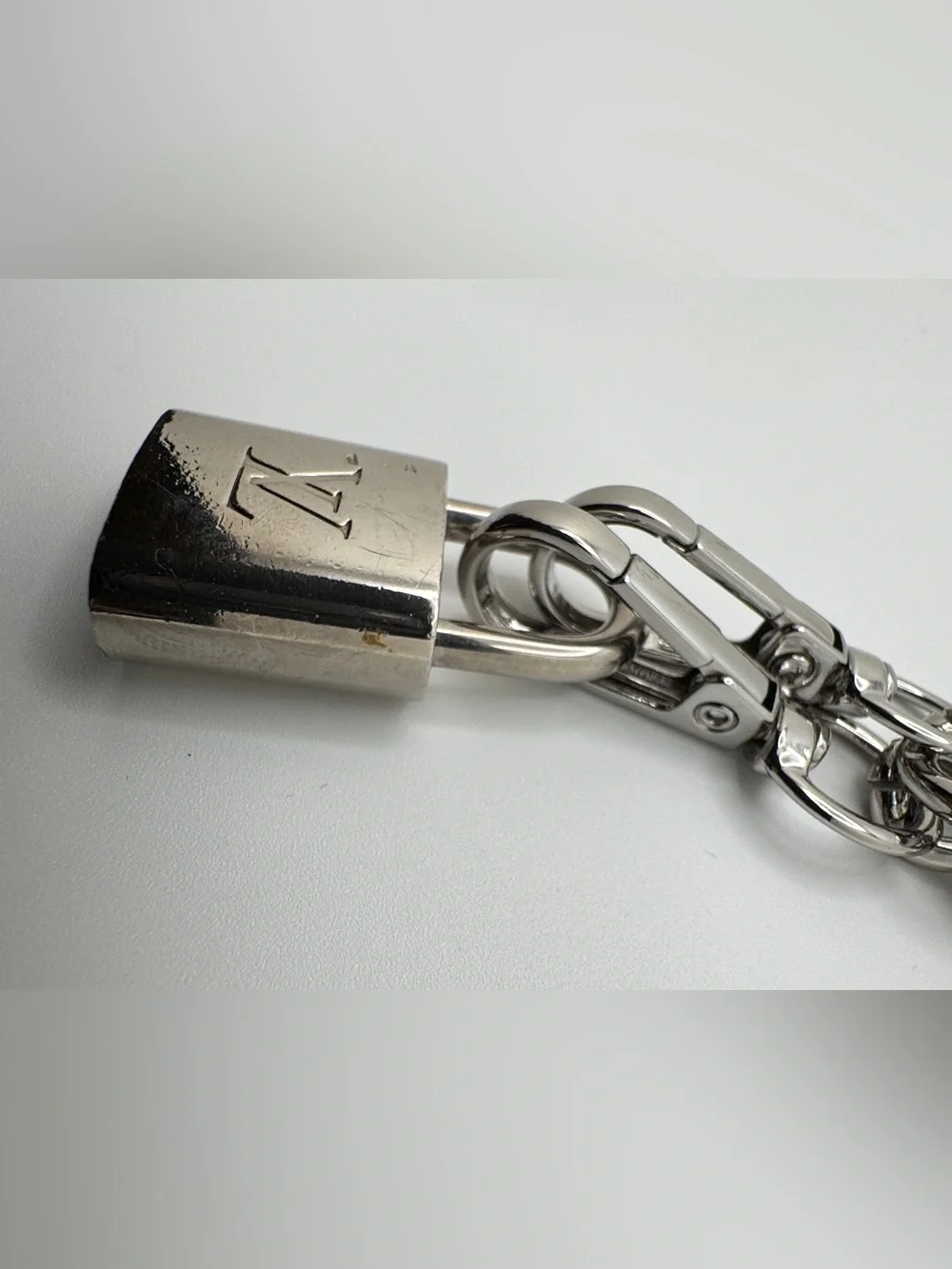 Louis Vuitton LV Silver Lock 447 with unbranded chain